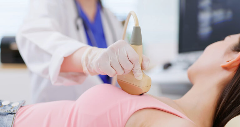 woman breast ultrasound examination